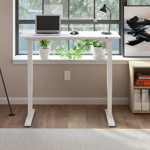 Lifestyle Image Front of Desk - Electro Elevate Electric Single Motor Height Adjustable Sit Stand Office Desk W1200xD800 White Top White Frame 5 Year Warranty