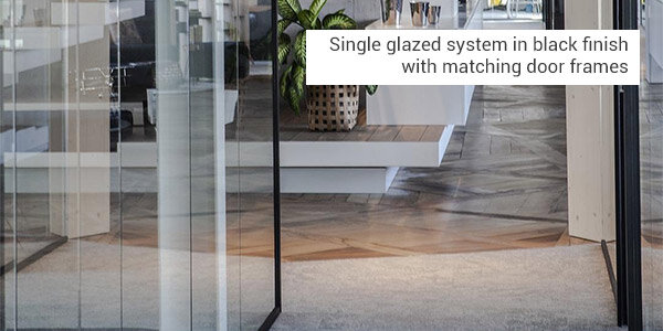 single glazed system in black finish with matching door frames